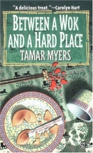 Cover art for Between a Wok and a Hard Place (Pennsylvania Dutch Mystery/An Amish Bed and Breakfast Mystery with Recipes #5)