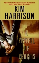 Cover art for A Fistful of Charms (Hollows #4)
