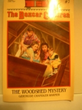 Cover art for The Woodshed Mystery (The Boxcar Children, Book 7)