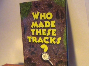 Cover art for WHO MADE THESE TRACKS, PAPERBACK, 2009 EDITION,A READ & LEARN MYSTERY BY SCHOLASTIC