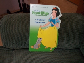 Cover art for Walt Disney's Snow White and the Seven Dwarfs: A Book of Opposites (A Golden sturdy shape book)