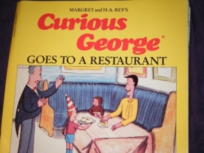 Cover art for curious george goes to a restaurant