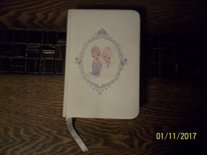 Cover art for Holy Bible: Precious Moments : King James Version Wedding Edition/White Leather