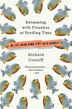 Cover art for Swimming with Piranhas at Feeding Time: My Life Doing Dumb Stuff with Animals