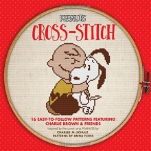 Cover art for Peanuts Cross-Stitch: 16 Easy-to-Follow Patterns Featuring Charlie Brown & Friends (Hometown Tales)