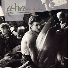 Cover art for a-ha - Hunting High And Low - Warner Bros. Records - 7599-25300-1, Warner Bros. Records - WX30