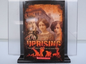 Cover art for Uprising: Three Young Women Caught in the Fire That Changed America