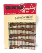 Cover art for Gunstock finishing and care : a textbook, covering the various means and methods by which modern protective and decorative coatings may be applied in the correct and suitable finishing of gun and rifle stocks ; for amateur and professional Use
