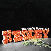 Cover art for The Show Must Go