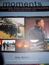 Cover art for Moments: The Pulitzer Prize-Winning Photographs- A Visual Chronicle of Our Time