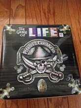 Cover art for The Game of Life Pirates of the Caribbean Collectors Tin